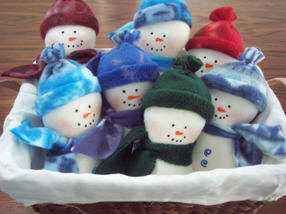complete sew instructions and a full size pattern to make a basket full of simple fleece snowmen